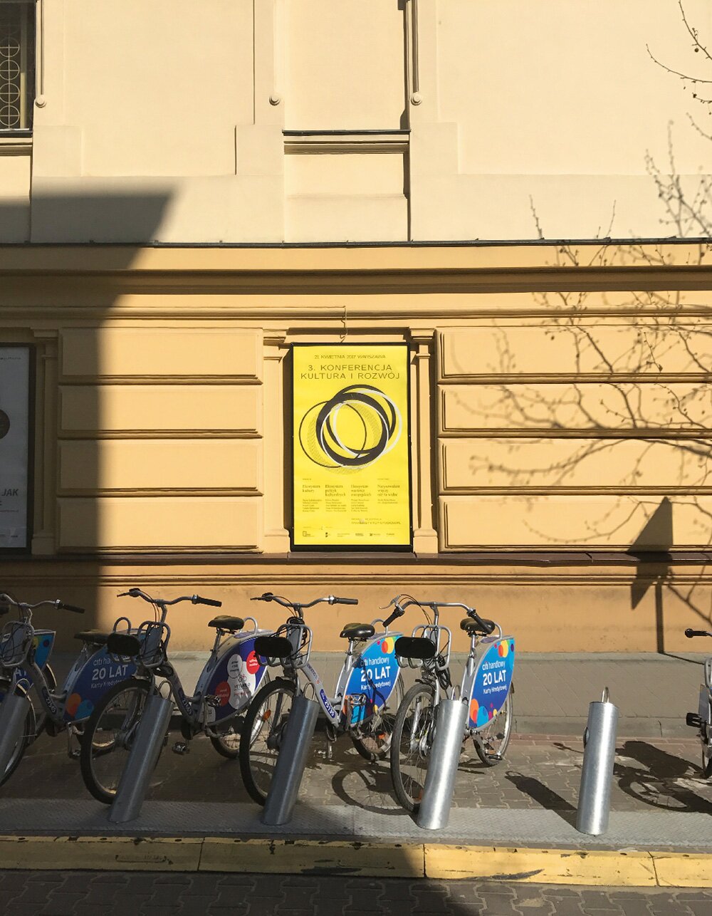 Poster for the conference hanging on the wall of the Political Critique's headquarters